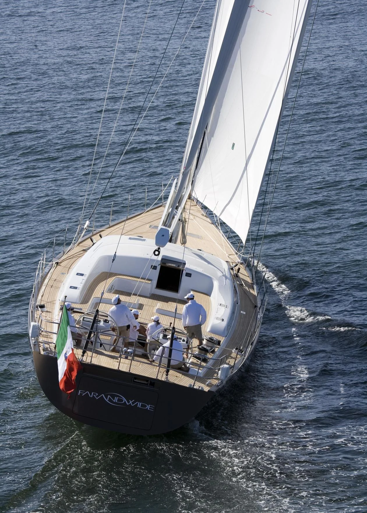 a boat sailing on the water aboard FAR AND WIDE Yacht for Sale