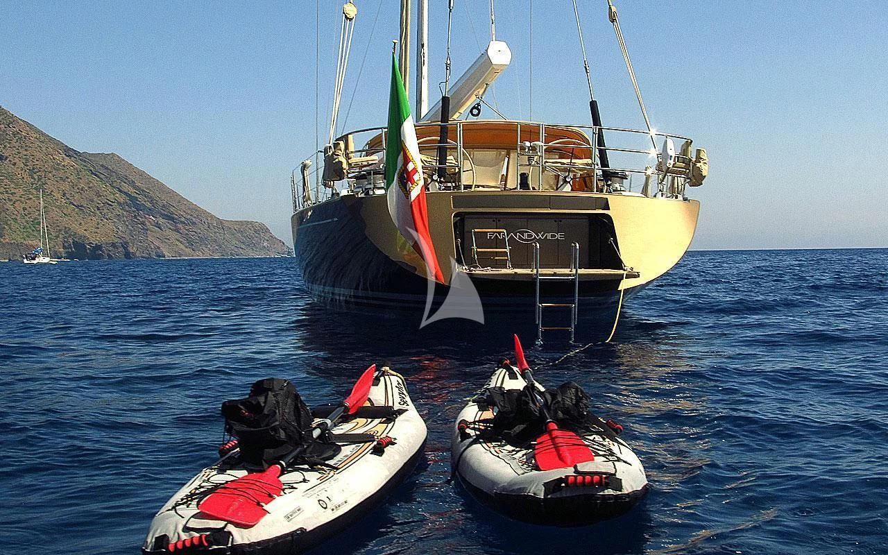a boat on the water aboard FAR AND WIDE Yacht for Sale