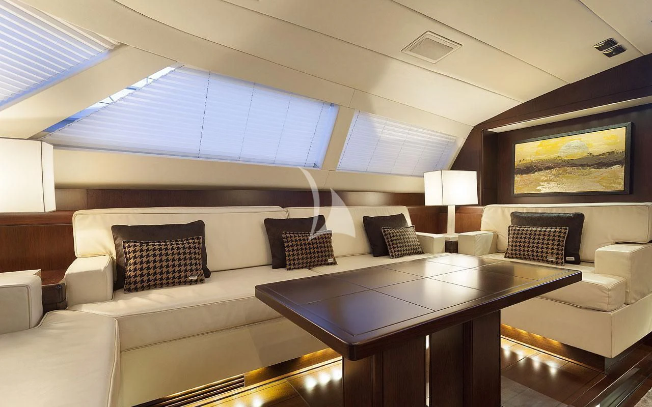 a living room with a large window aboard FAR AND WIDE Yacht for Sale
