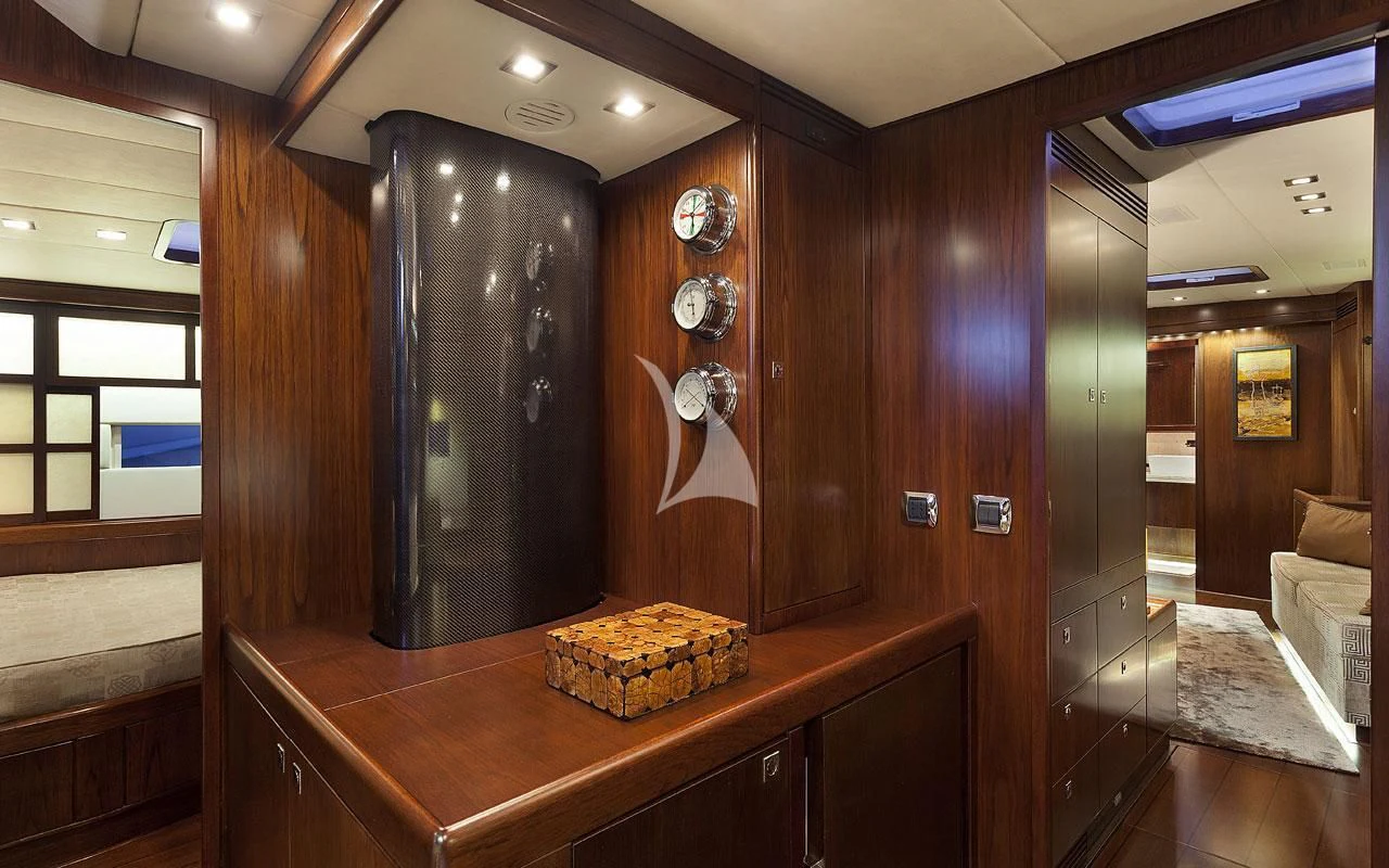 a brown and black kitchen aboard FAR AND WIDE Yacht for Sale