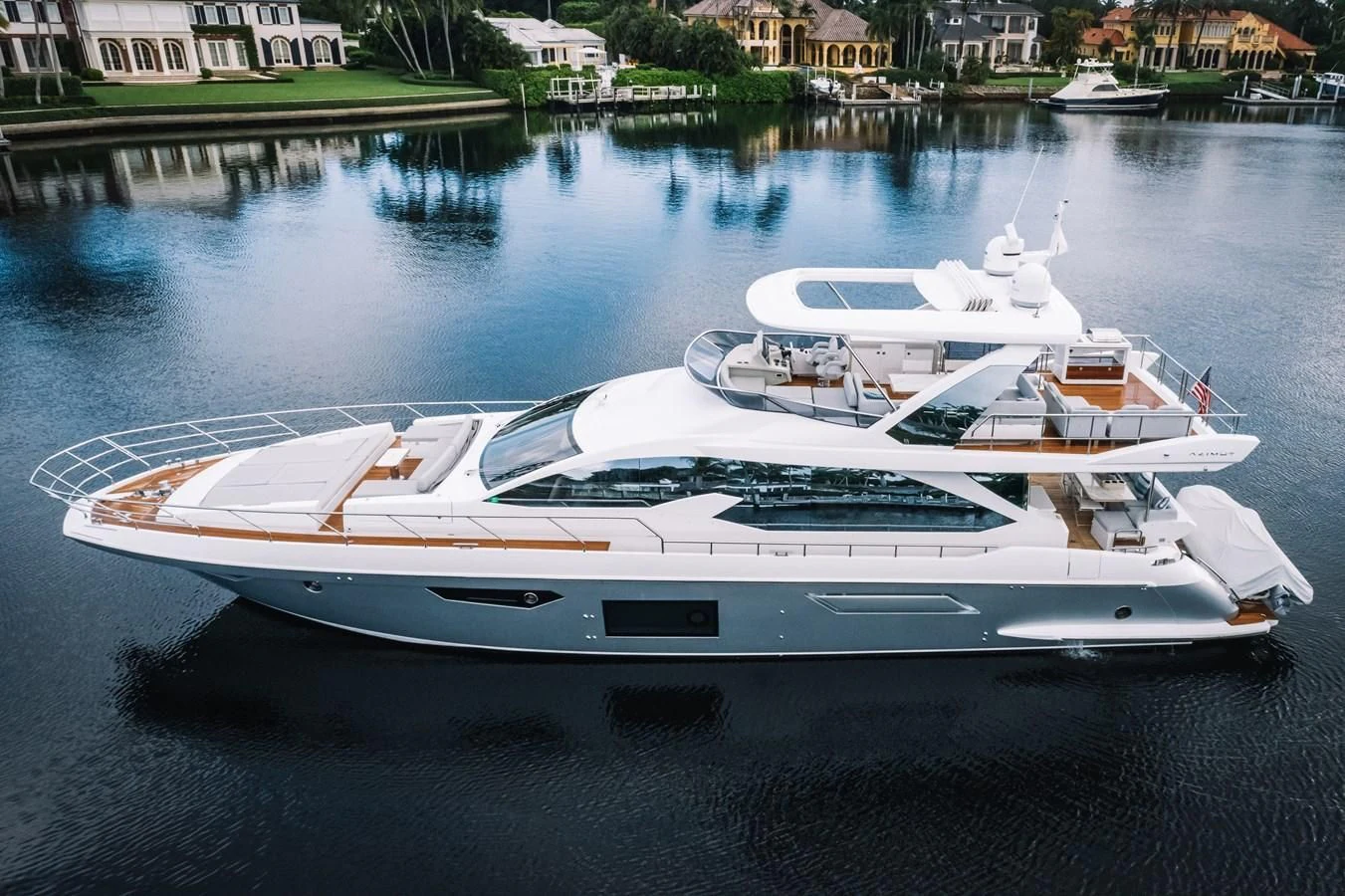 a white yacht on the water aboard CIAO BELLA Yacht for Sale