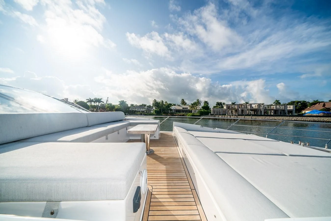 a deck with a view of a city and water aboard CIAO BELLA Yacht for Sale