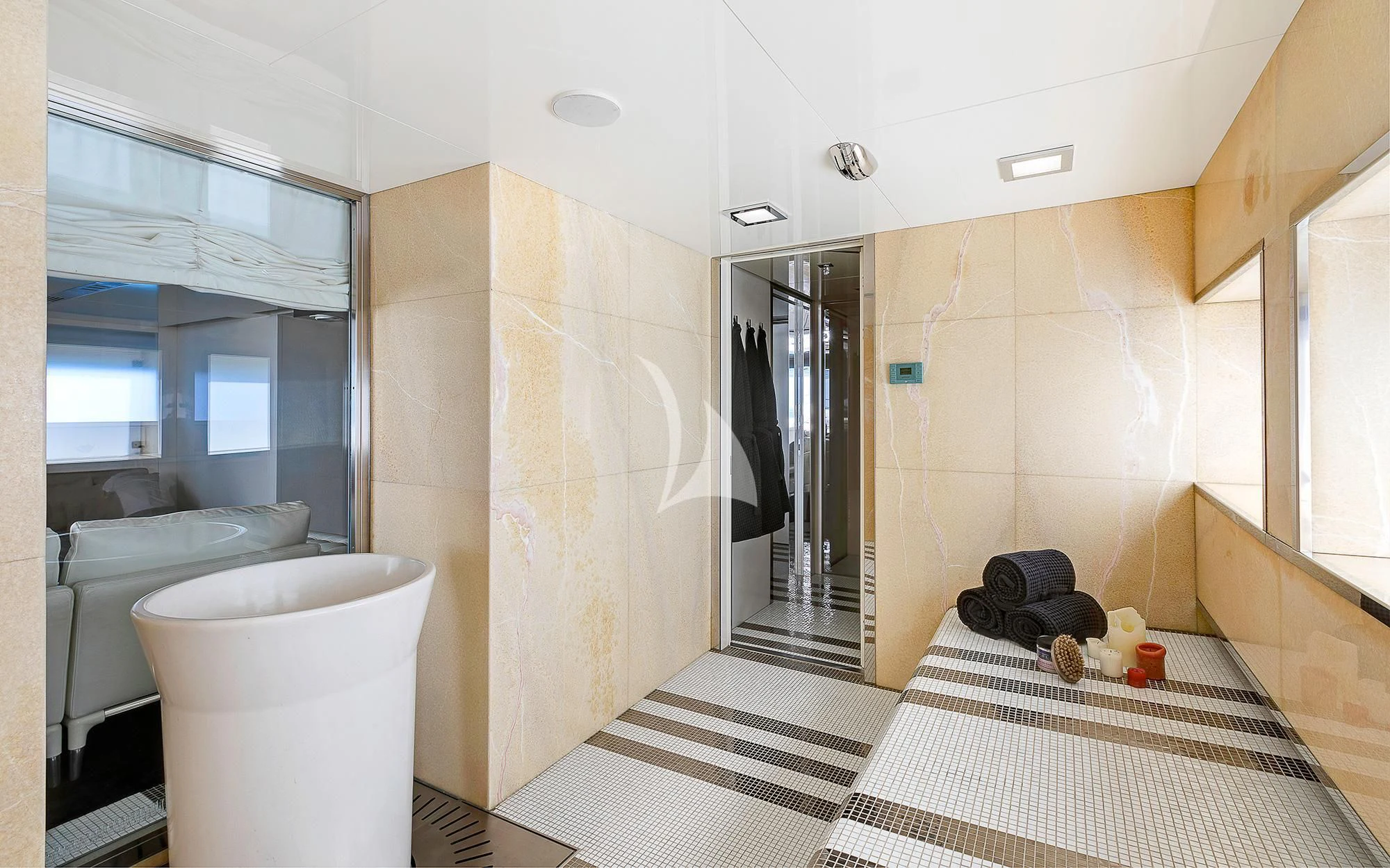 a bathroom with a large mirror aboard VICKY Yacht for Charter
