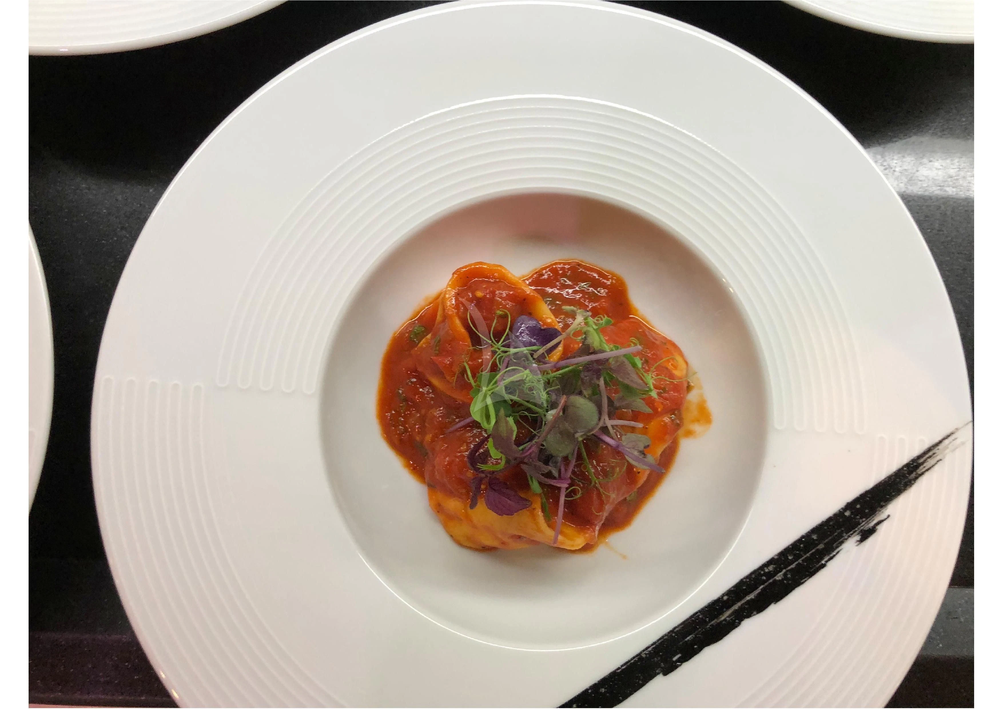 a plate of food aboard VICKY Yacht for Charter