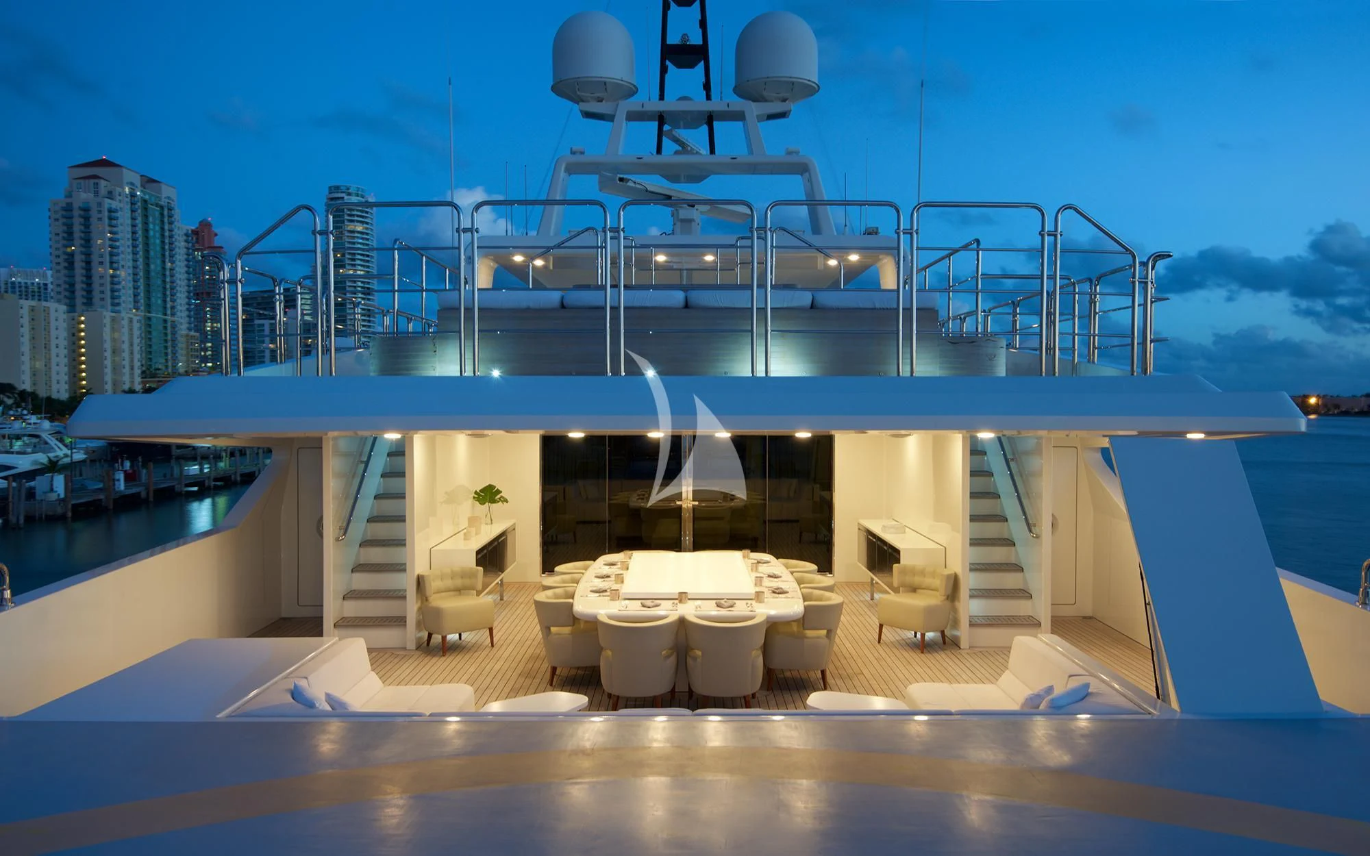 a large white boat on a body of water aboard VICKY Yacht for Charter