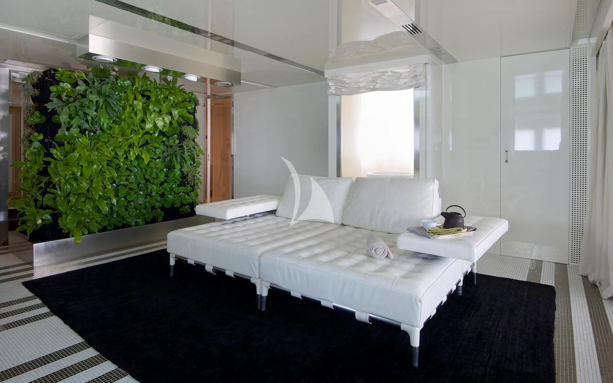 a white bed in a room aboard VICKY Yacht for Charter