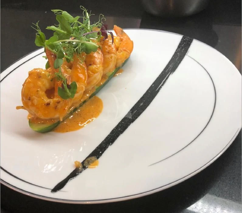 a plate of food aboard VICKY Yacht for Charter