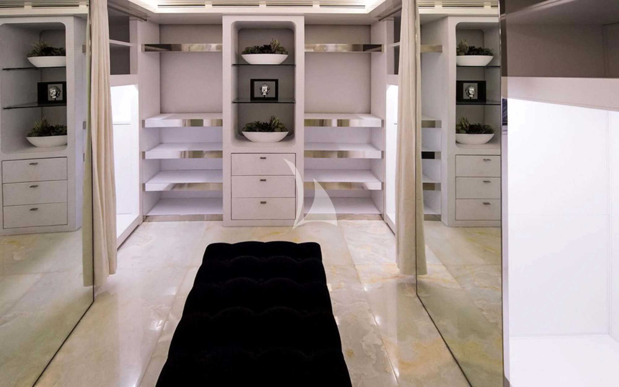 a room with shelves and a rug aboard VICKY Yacht for Charter
