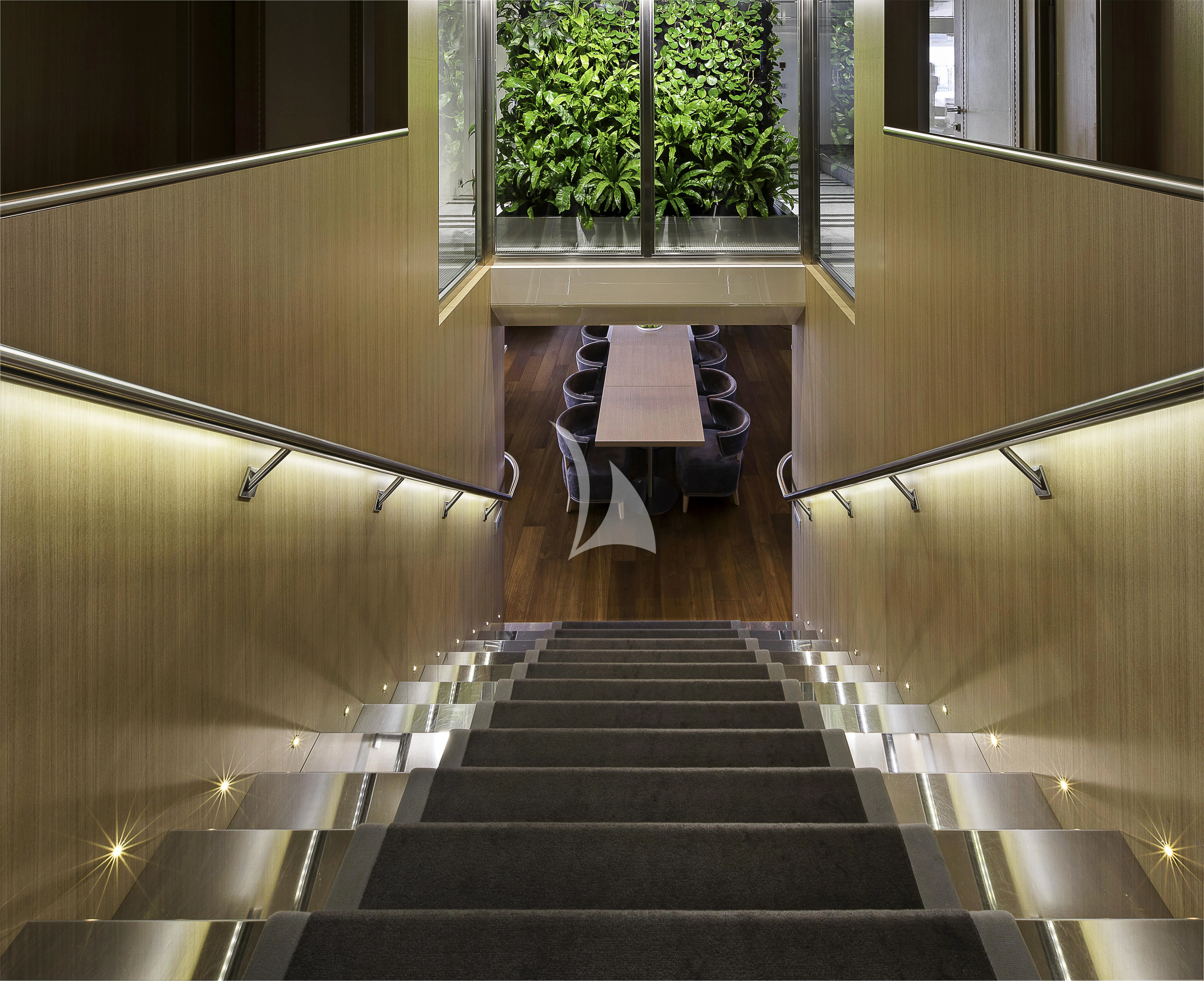a chair on a staircase aboard VICKY Yacht for Charter