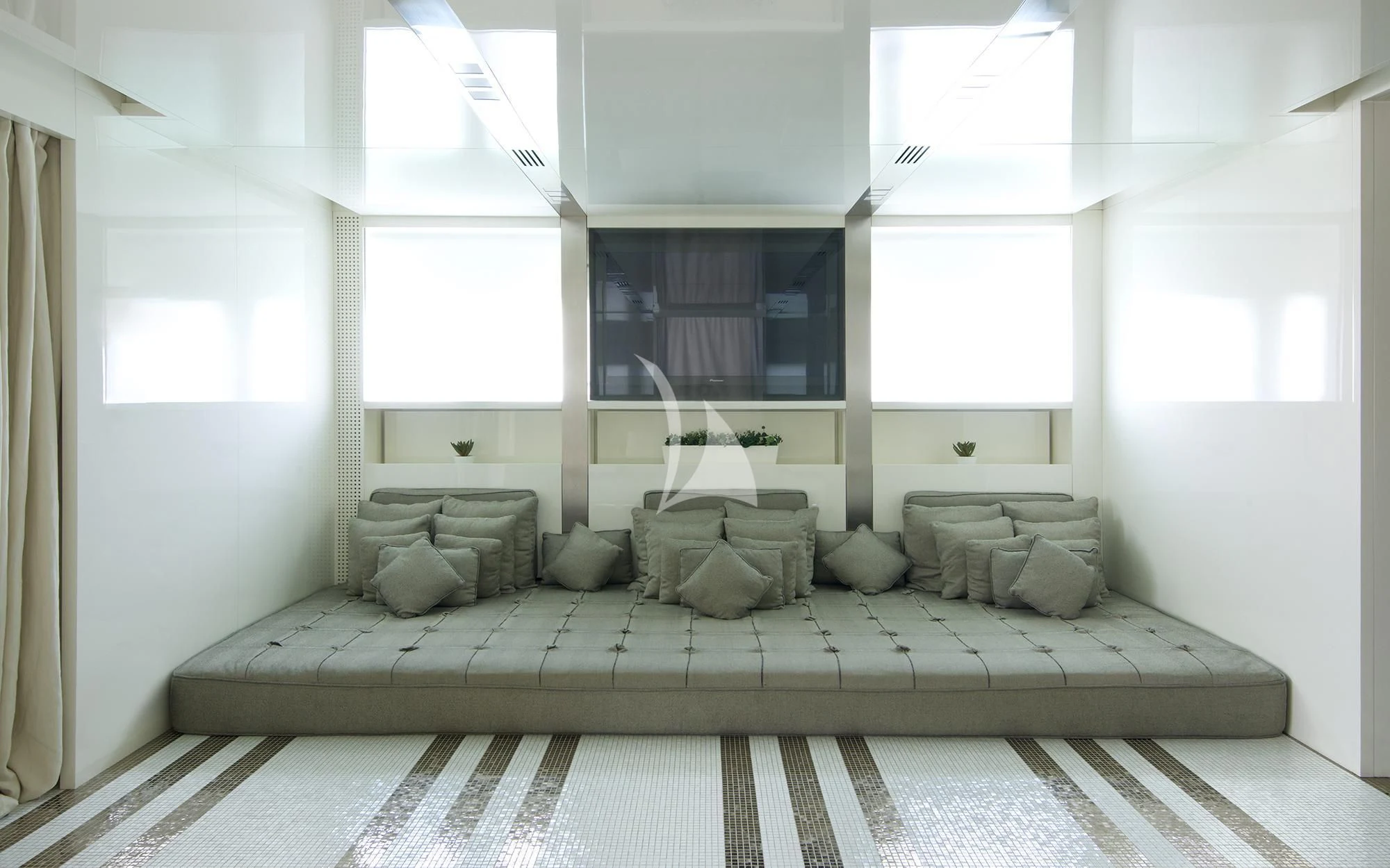 a bed with pillows aboard VICKY Yacht for Charter