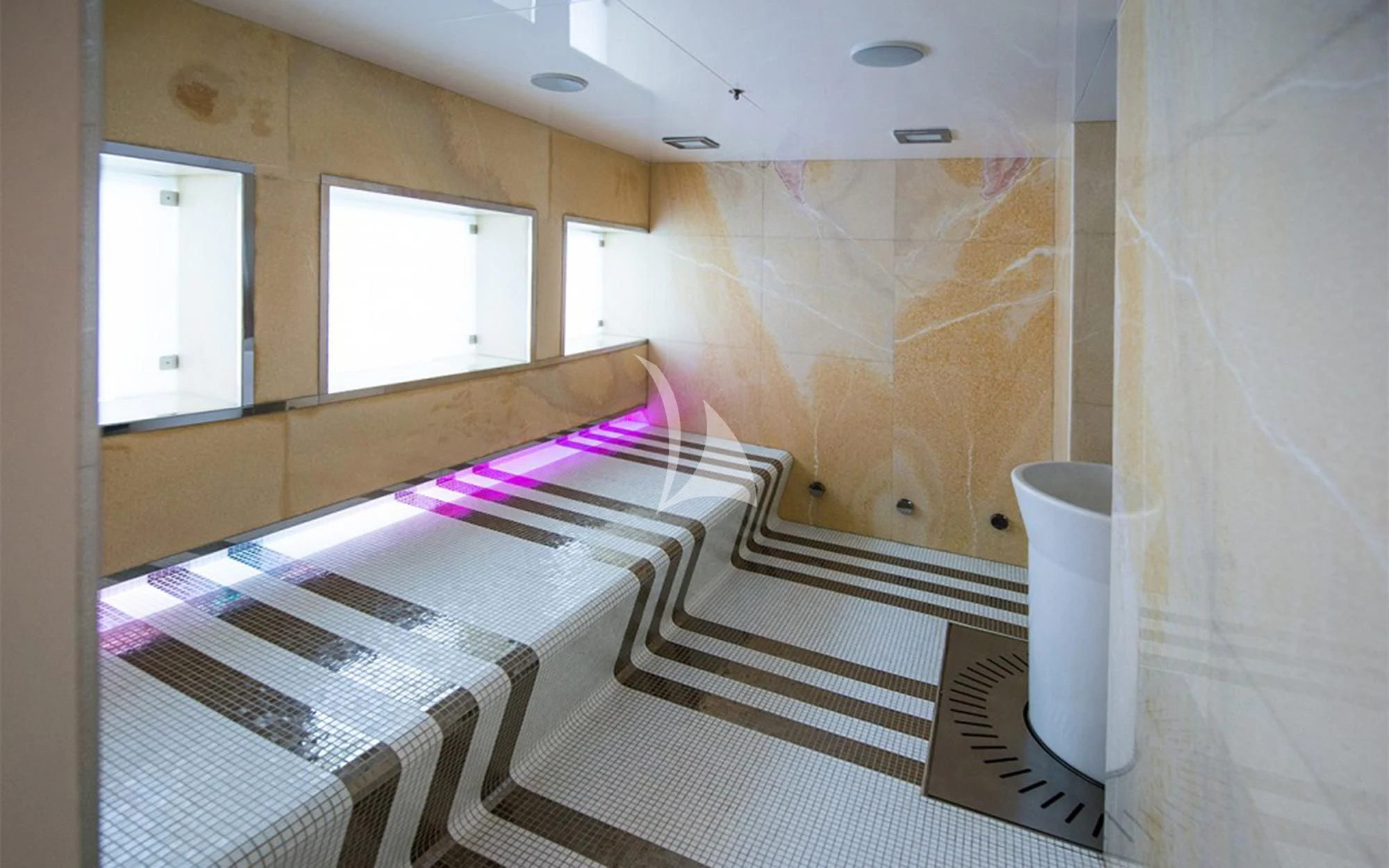 a room with a couch and a table aboard VICKY Yacht for Charter