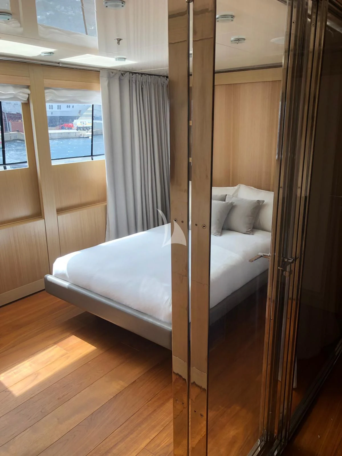 a bed in a room aboard VICKY Yacht for Charter