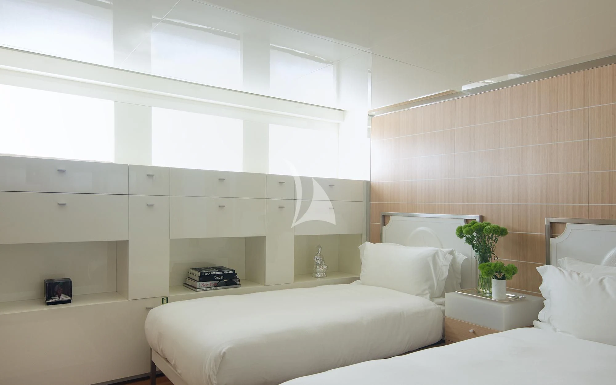 a room with white furniture aboard VICKY Yacht for Charter