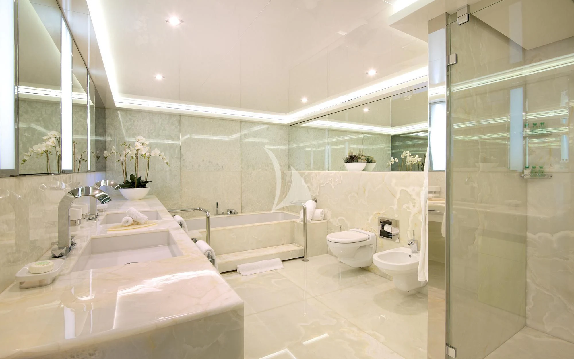 a bathroom with a tub sink and toilet aboard VICKY Yacht for Charter