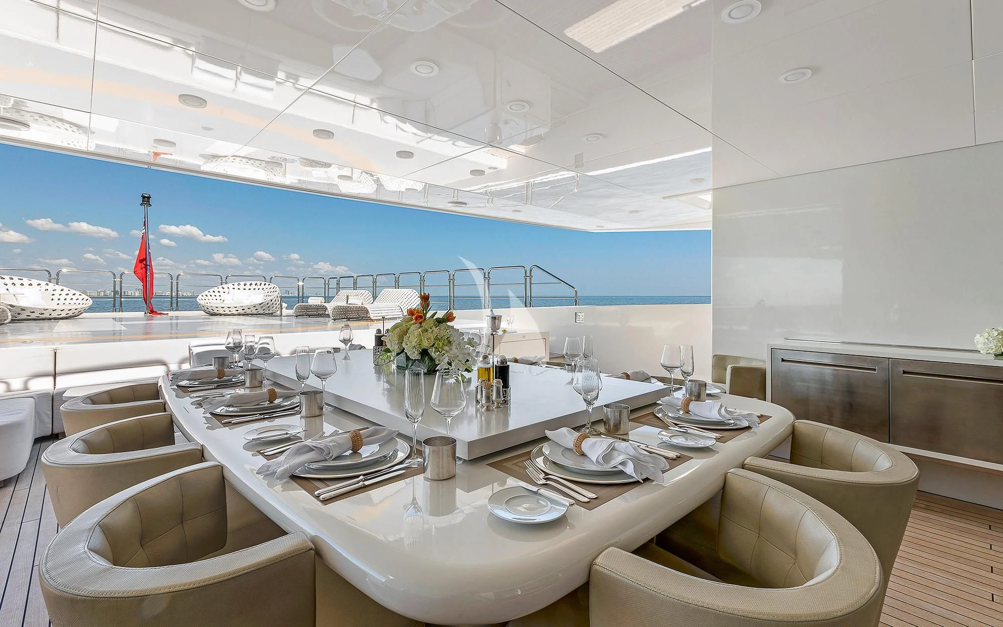a table with plates and glasses on it aboard VICKY Yacht for Charter
