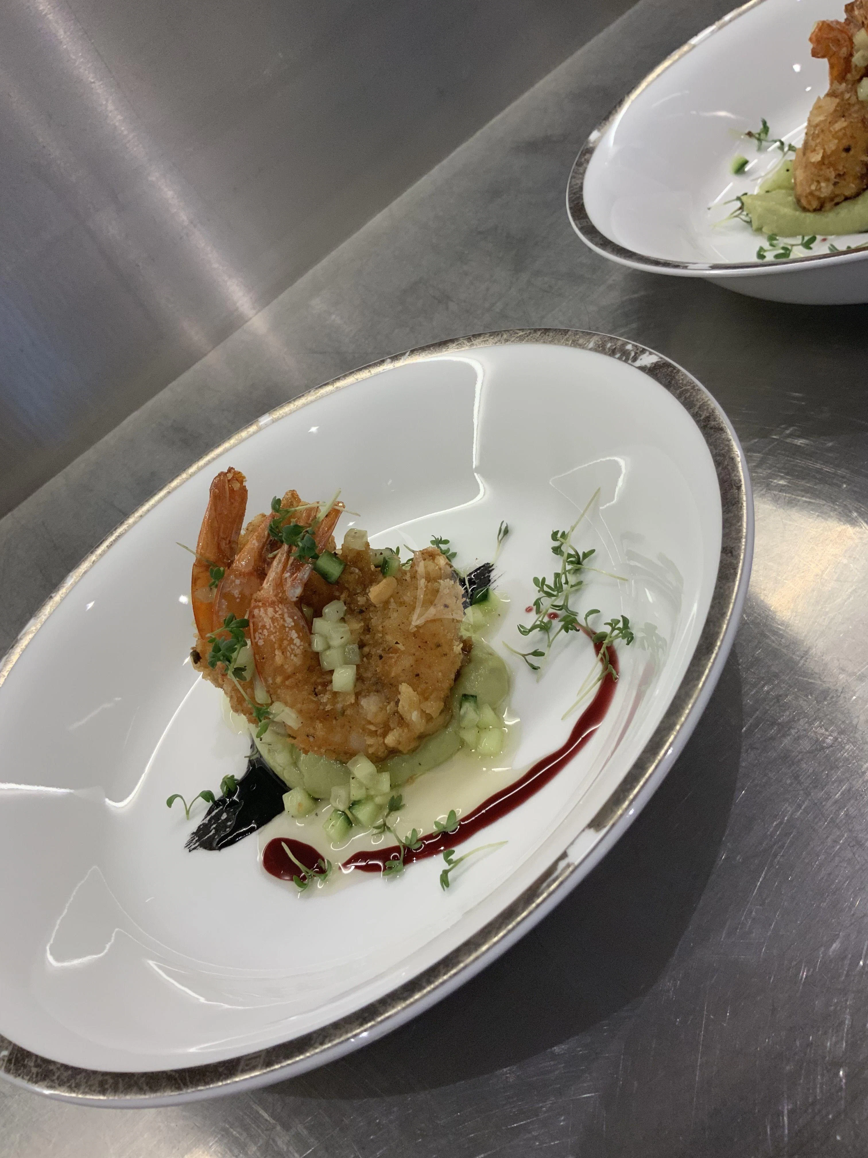 a plate of food aboard VICKY Yacht for Charter