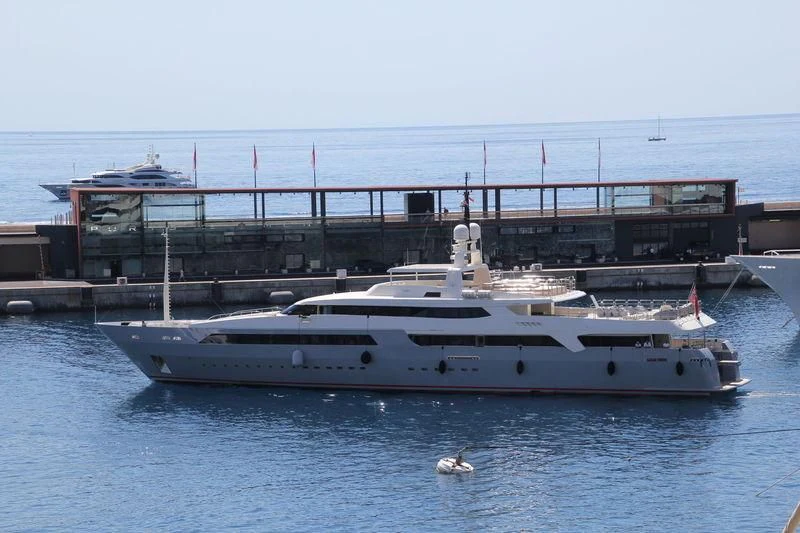 a large white boat sits in the water aboard VICKY Yacht for Charter