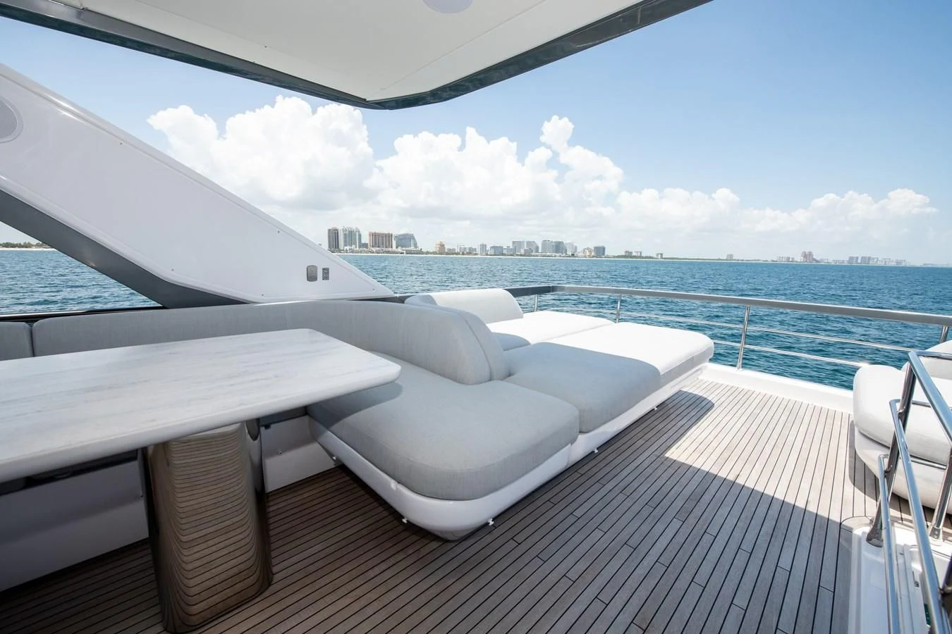 a boat on a deck aboard CRIMSON Yacht for Sale