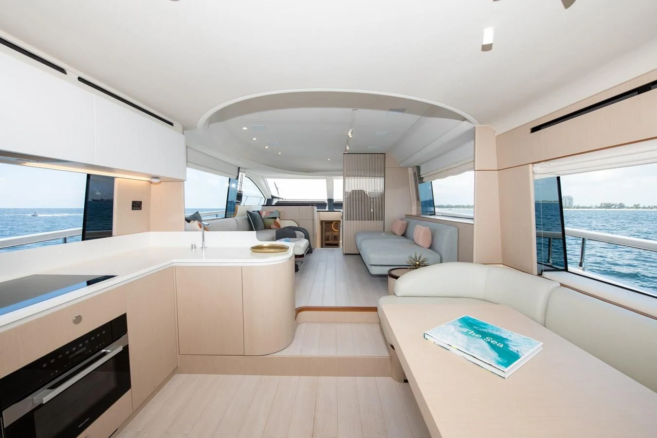a modern kitchen with a large open floor plan aboard CRIMSON Yacht for Sale