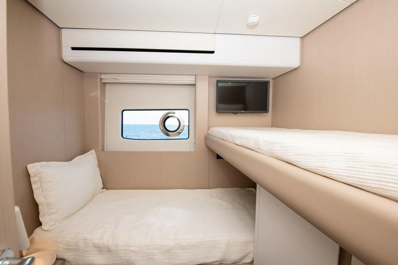 a room with two beds aboard CRIMSON Yacht for Sale