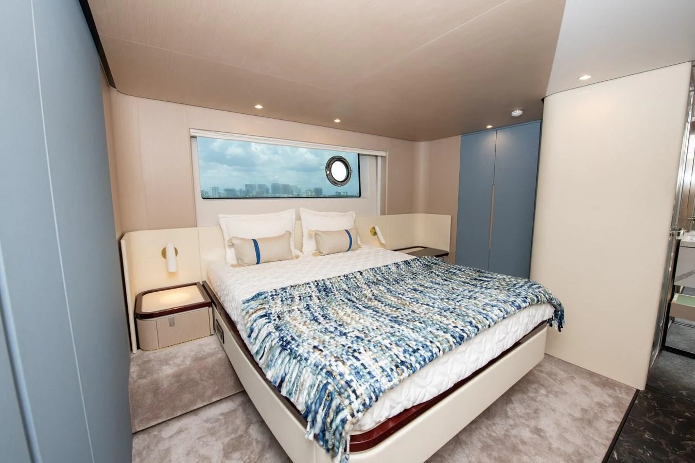 a bed in a room aboard CRIMSON Yacht for Sale