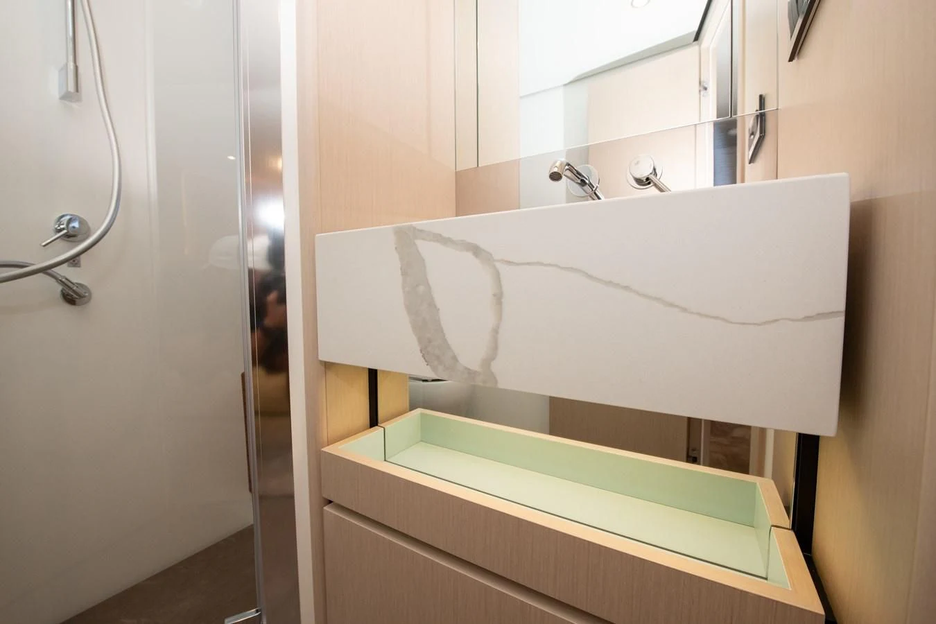 a white bathtub with a white cover aboard CRIMSON Yacht for Sale