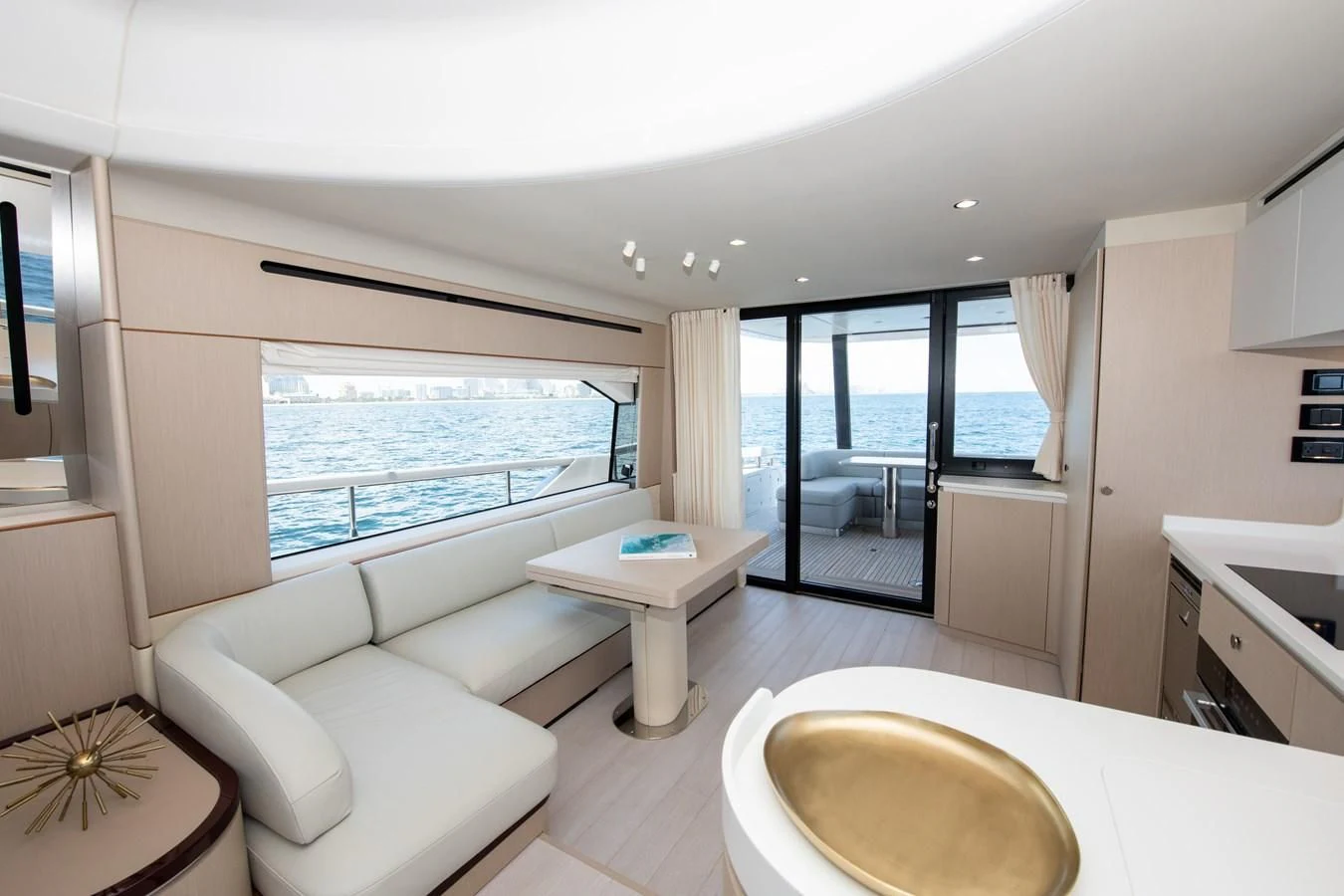 a room with a table and chairs aboard CRIMSON Yacht for Sale