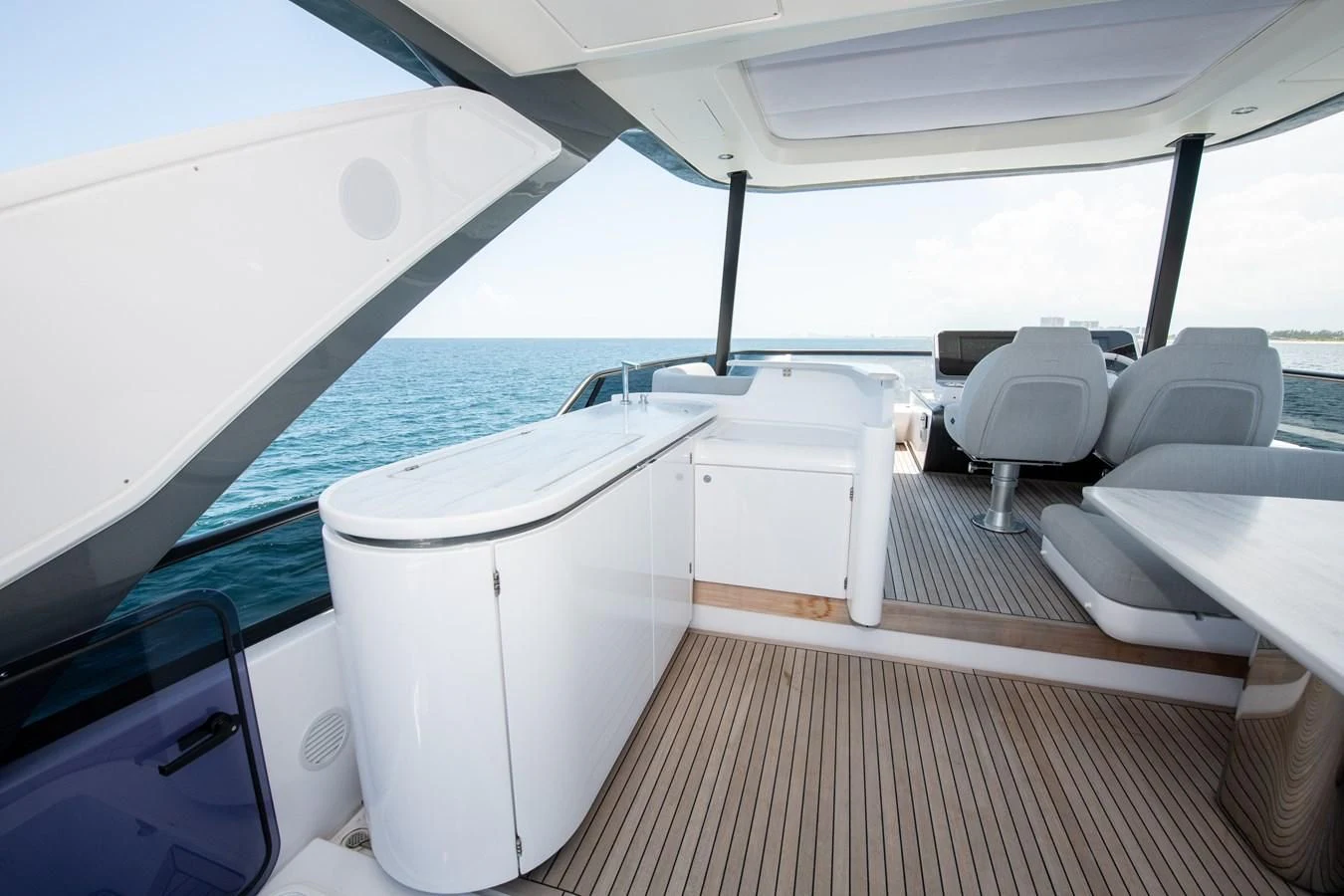a boat on a deck aboard CRIMSON Yacht for Sale