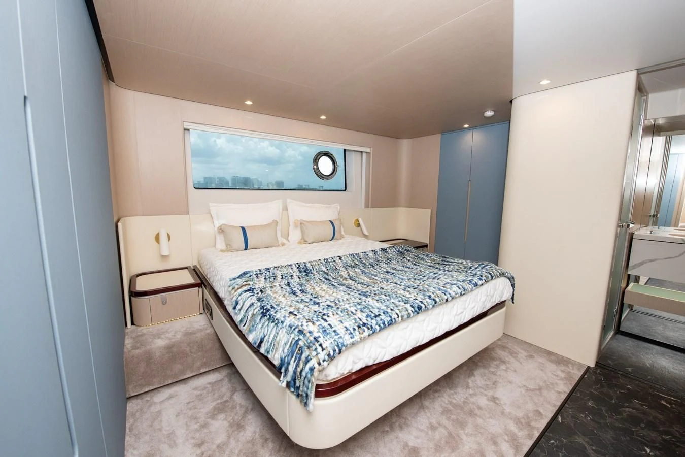 a bed in a room aboard CRIMSON Yacht for Sale