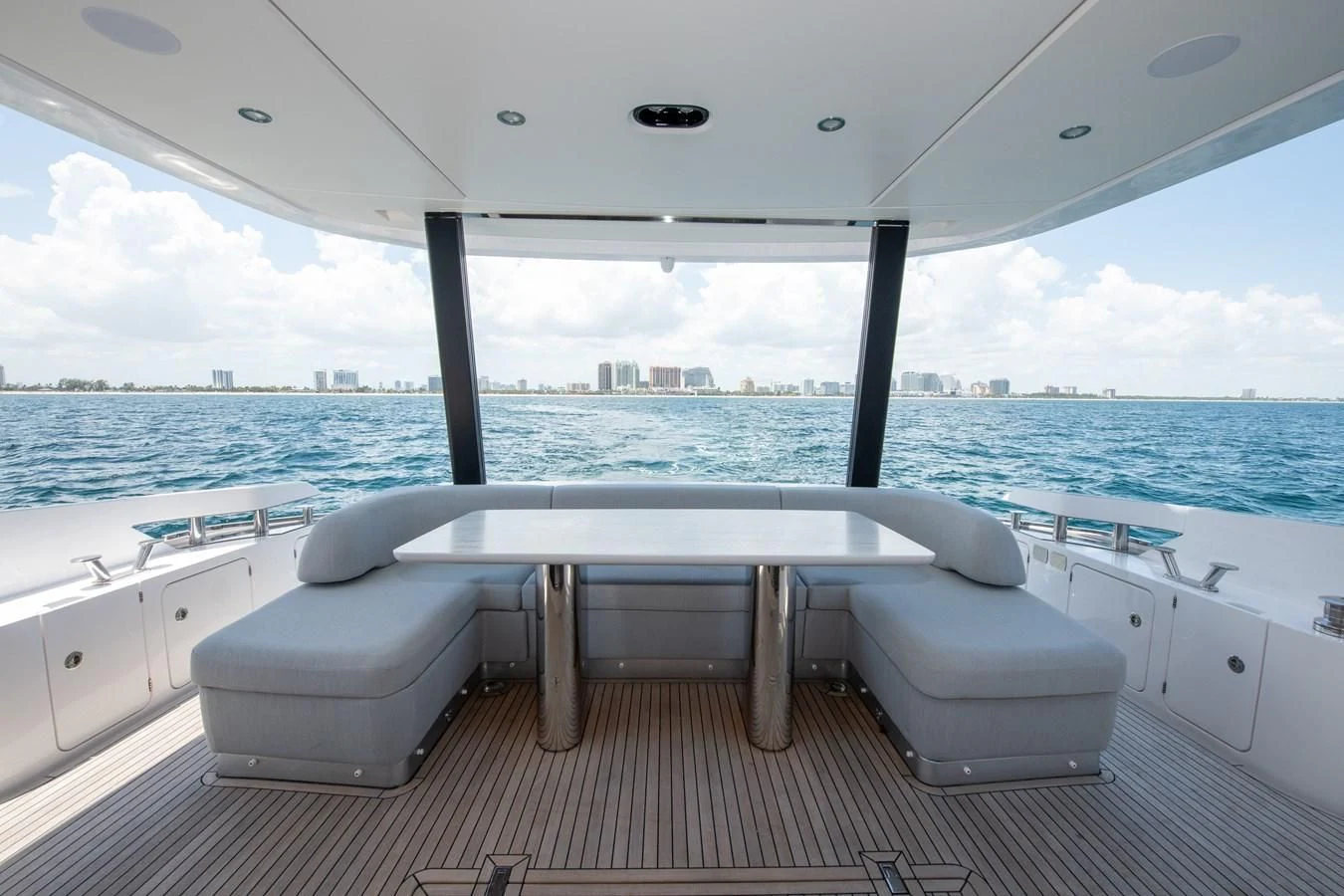 a white lounge chair on a boat aboard CRIMSON Yacht for Sale
