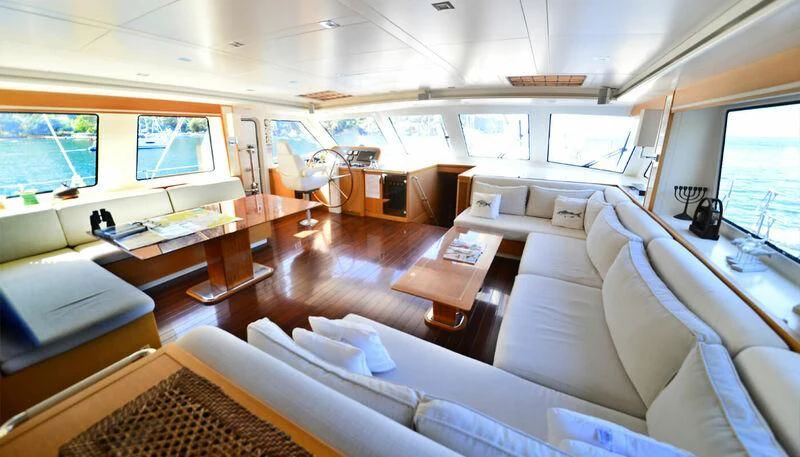 a room with a couch and a table aboard ZELDA Yacht for Sale