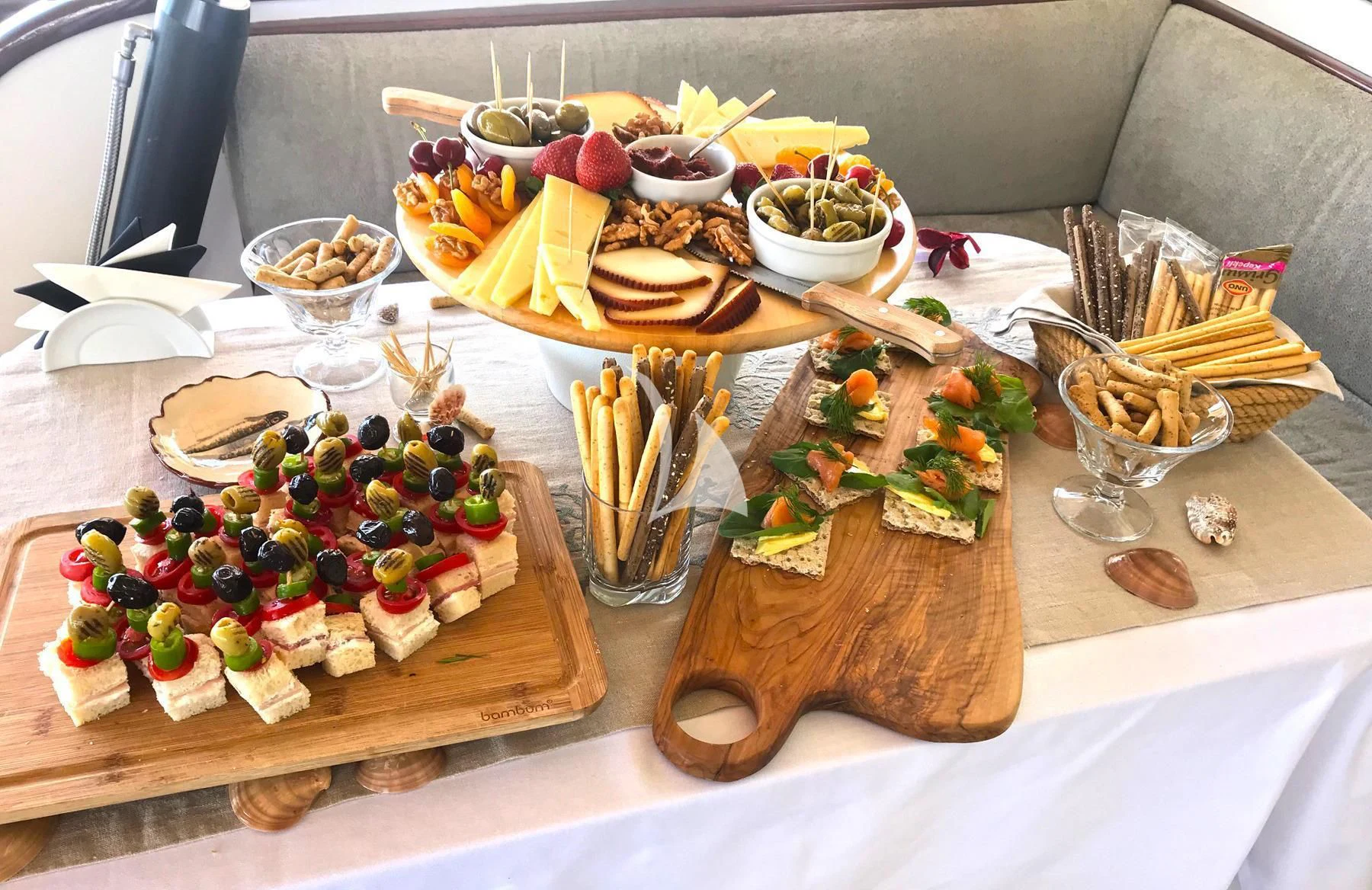 a table with food and drinks aboard ZELDA Yacht for Sale