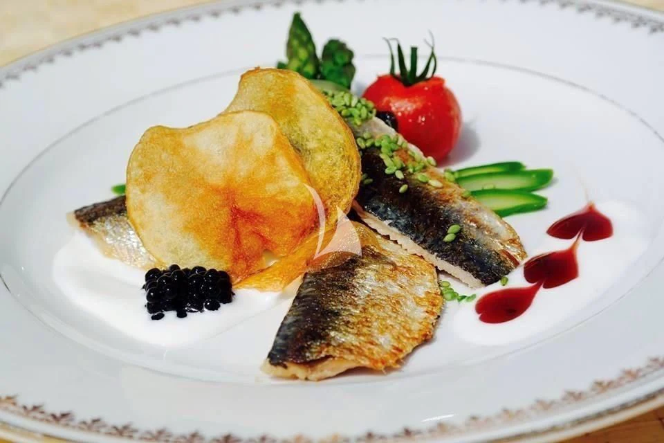 a plate of food aboard ZELDA Yacht for Sale