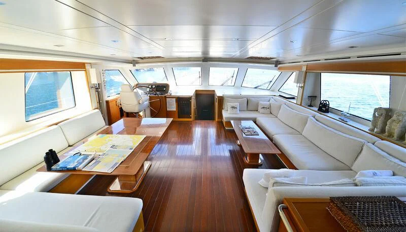 a room with a couch and a table aboard ZELDA Yacht for Sale