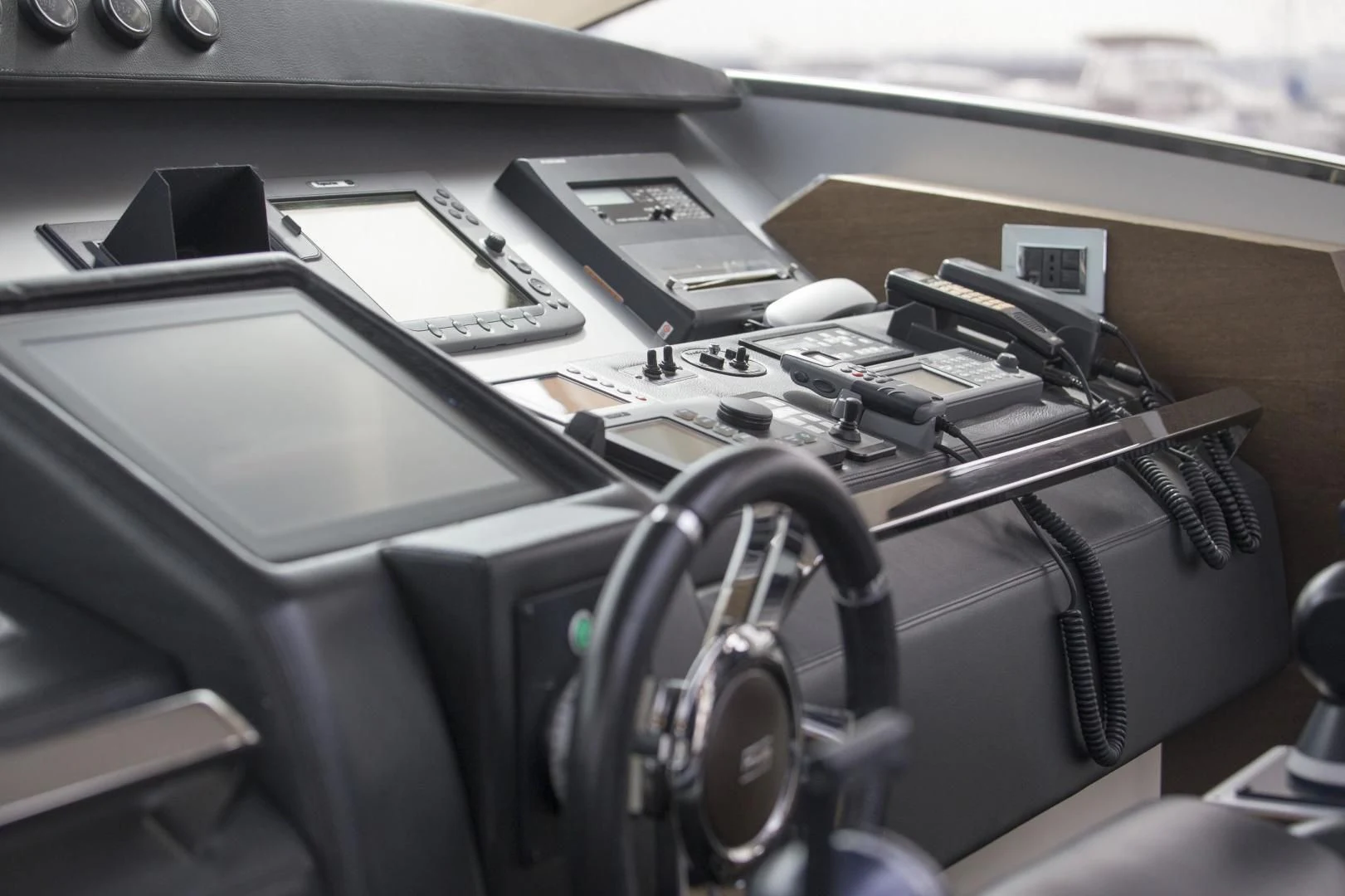 a car with a phone and other electronics in it aboard SHU SHE Yacht for Sale
