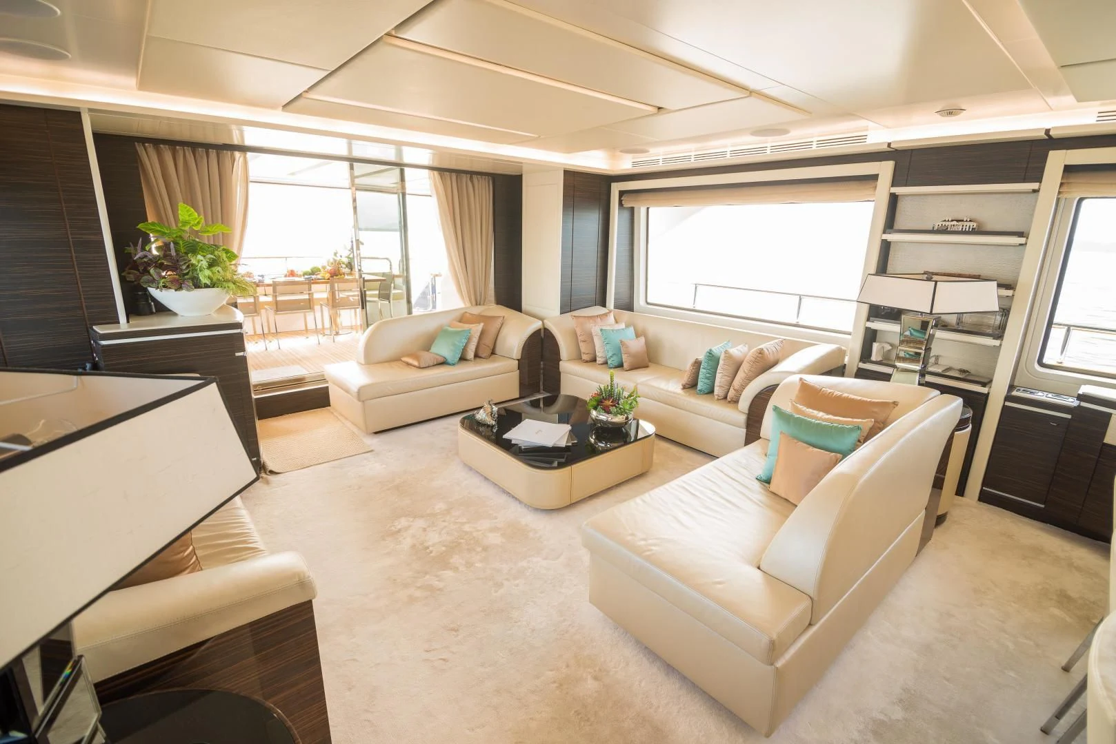 a living room with a couch and a table aboard BLUE BAY Yacht for Sale