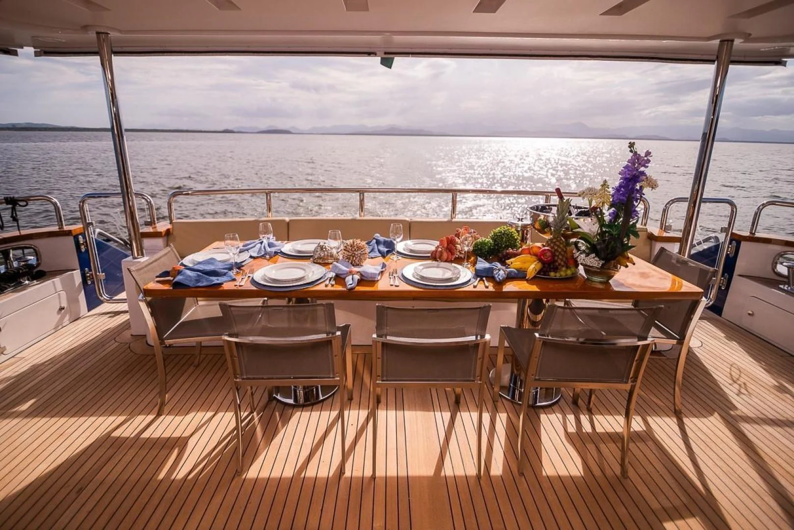 a table set for a meal on a boat aboard BLUE BAY Yacht for Sale
