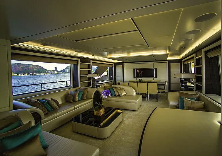 a living room with a large window aboard BLUE BAY Yacht for Sale