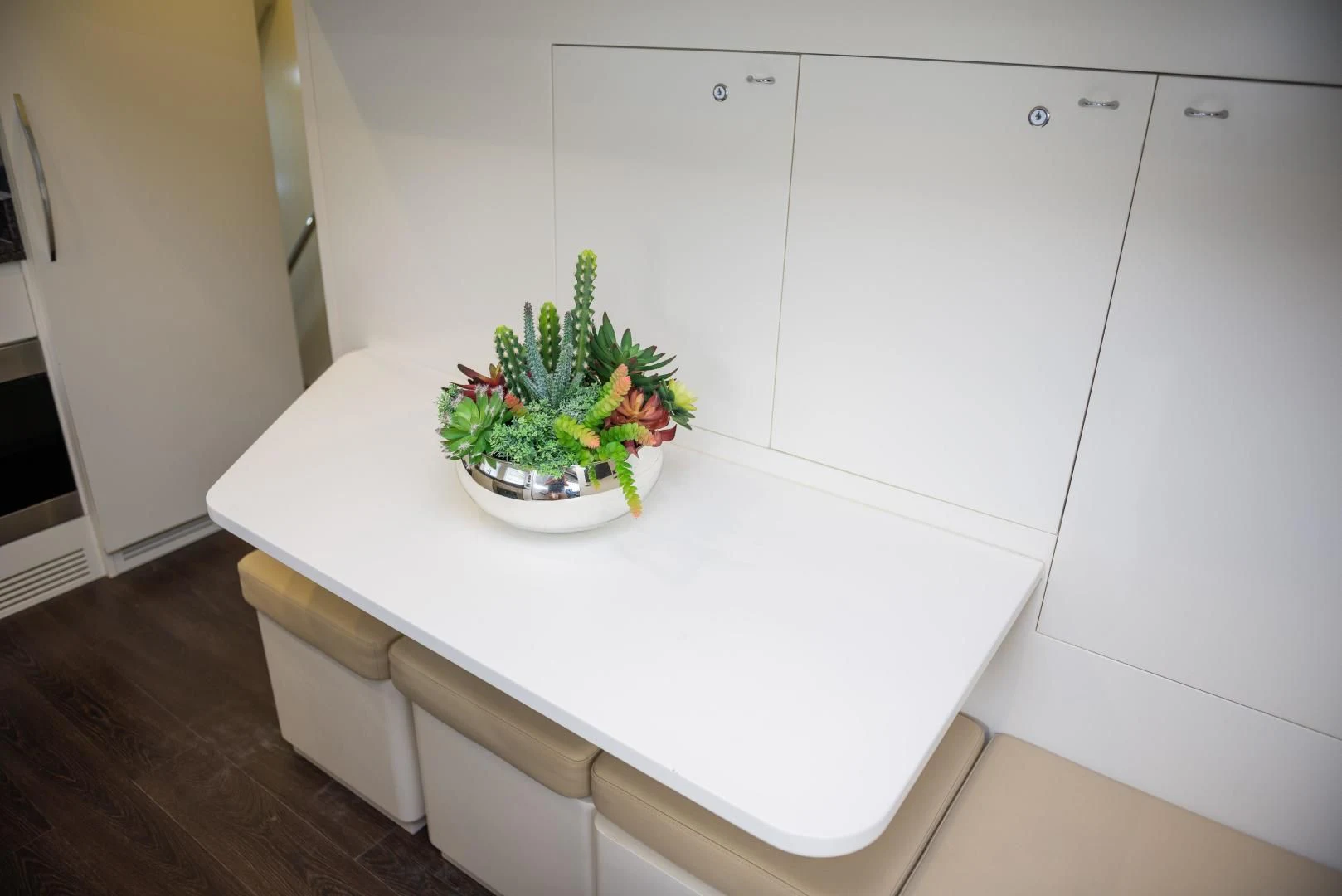 a plant in a pot on a counter aboard BLUE BAY Yacht for Sale