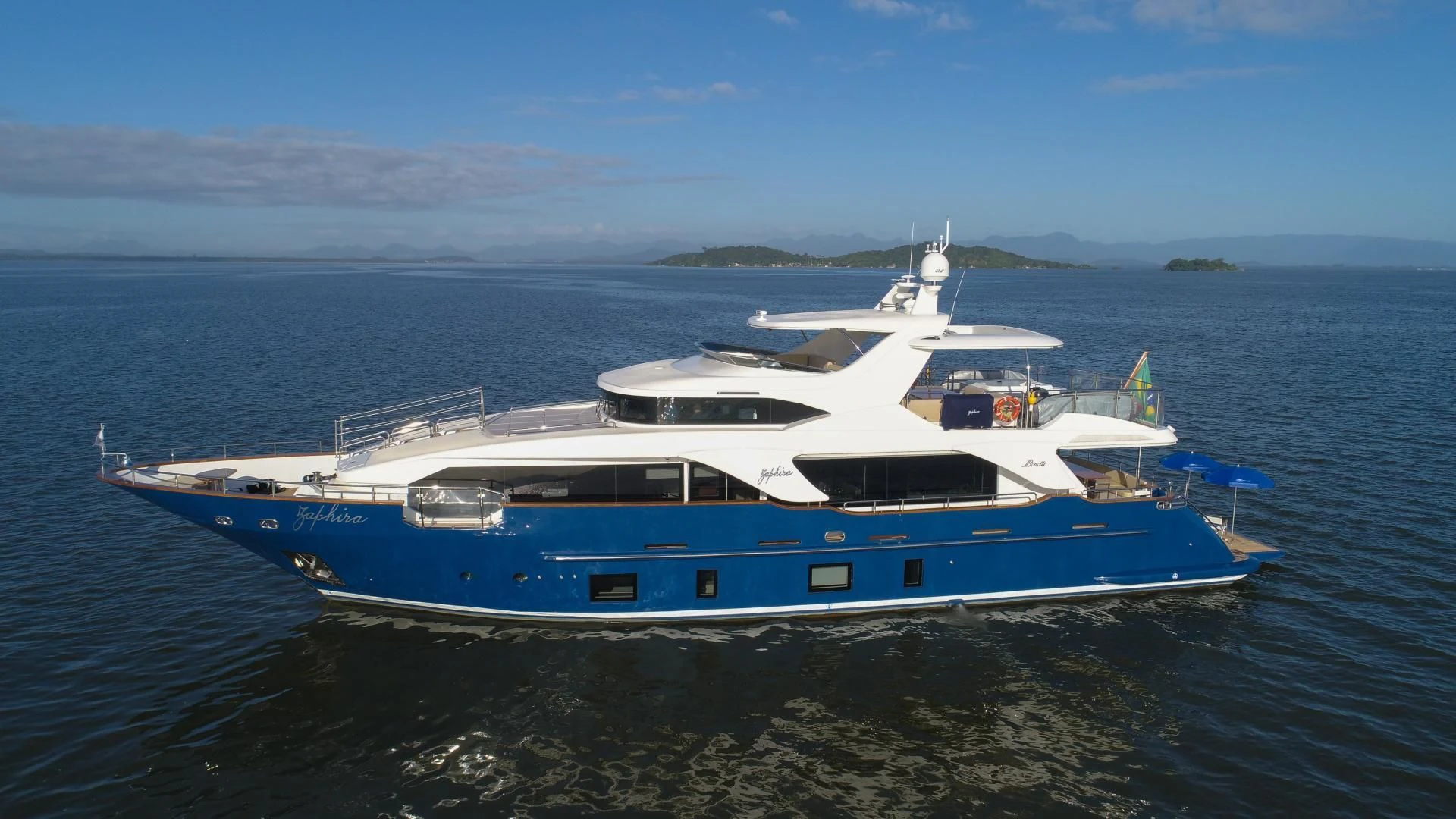 a large boat in the water aboard BLUE BAY Yacht for Sale