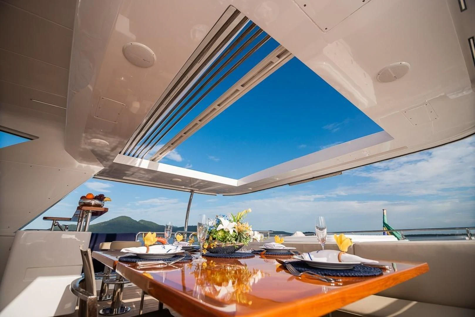 a room with a table and chairs aboard BLUE BAY Yacht for Sale