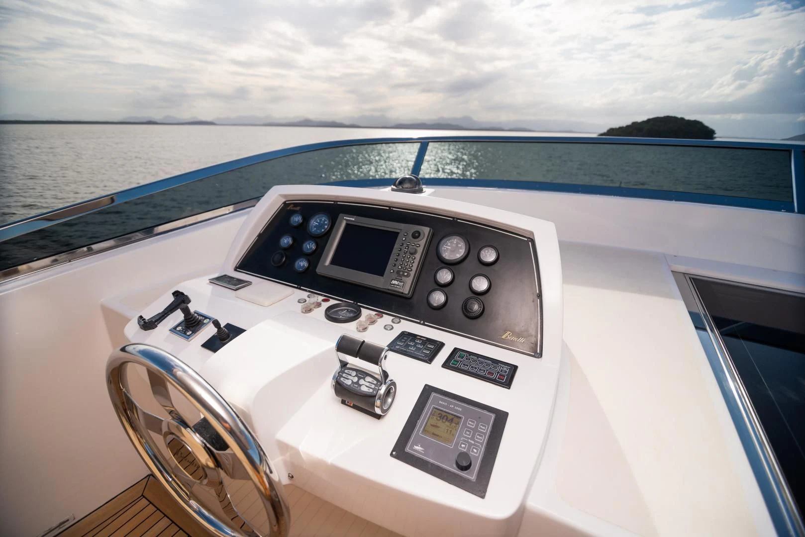 a boat with a radio and a ship in the water aboard BLUE BAY Yacht for Sale