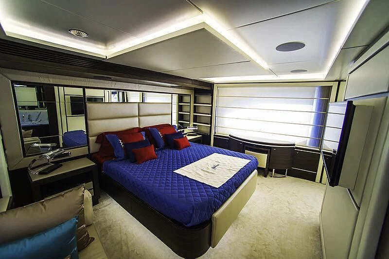 a room with a bed and a couch aboard BLUE BAY Yacht for Sale