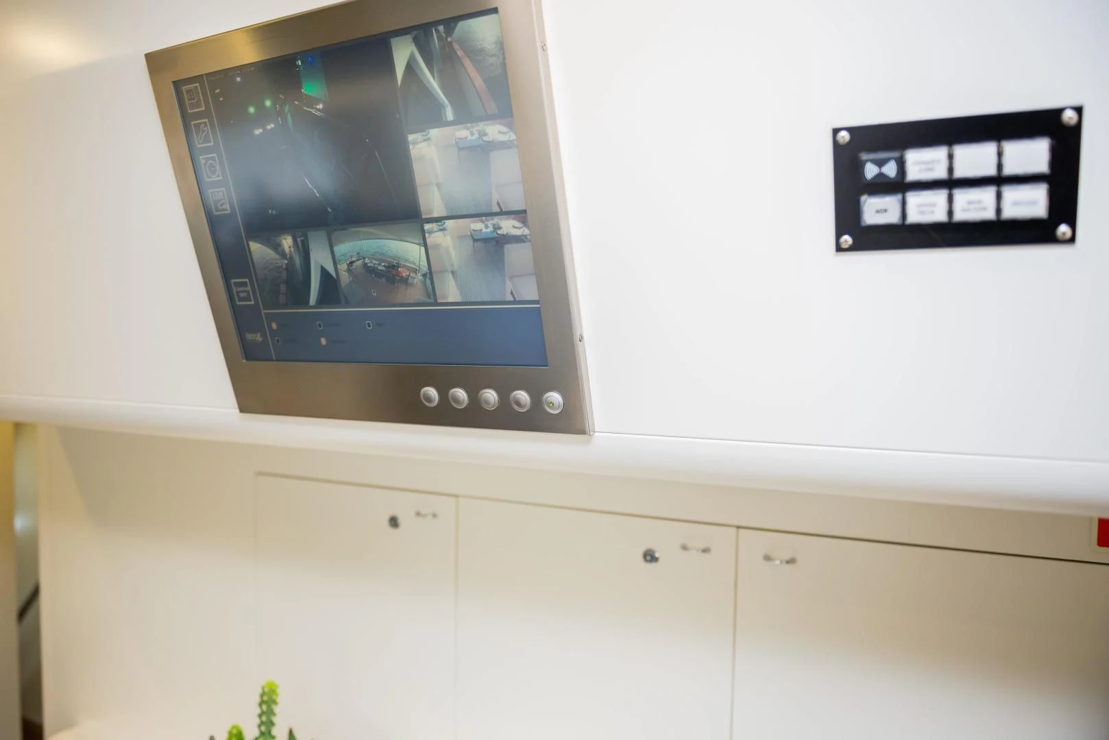 a tv on a wall aboard BLUE BAY Yacht for Sale