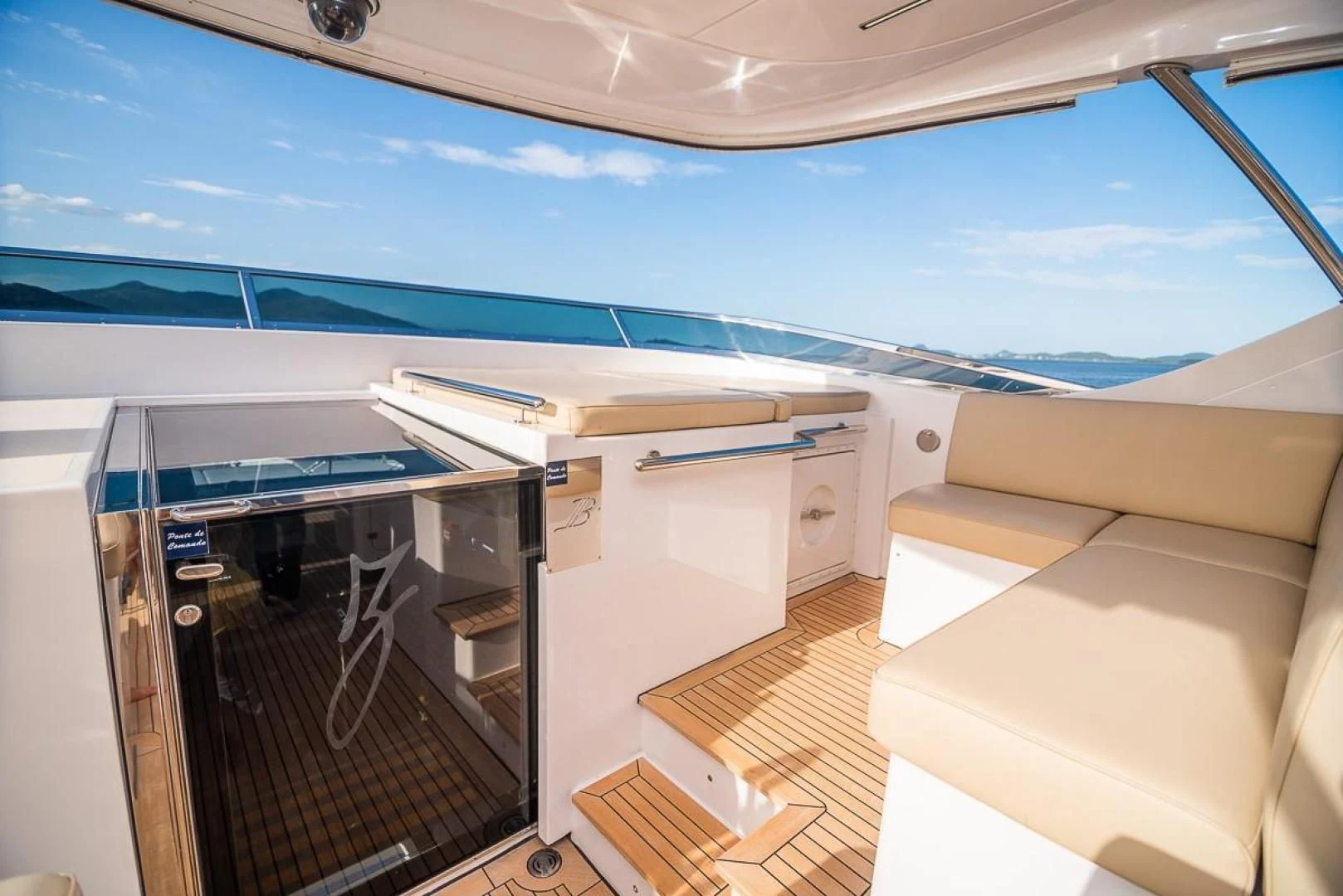 a room with a bed and a large window aboard BLUE BAY Yacht for Sale