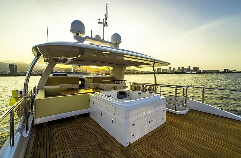a boat on a deck aboard BLUE BAY Yacht for Sale