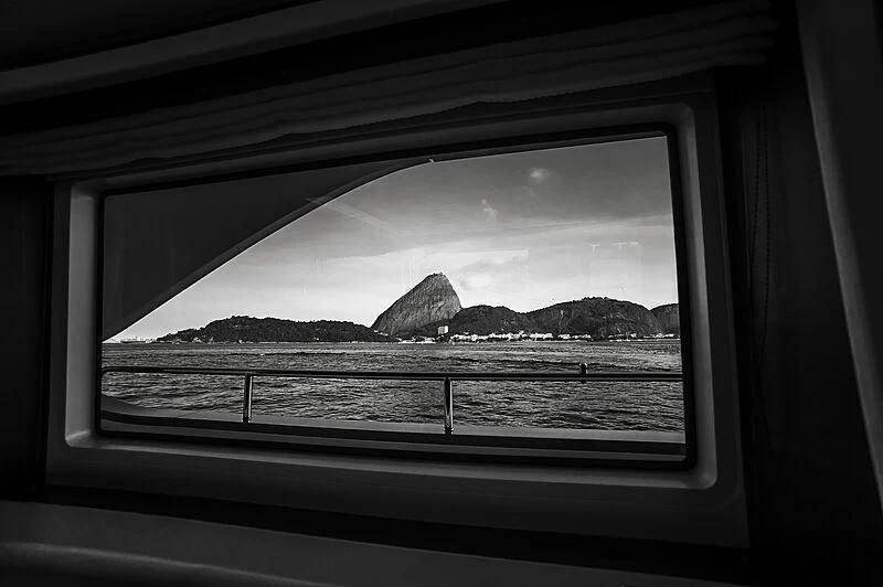 a view of a mountain from a window aboard BLUE BAY Yacht for Sale