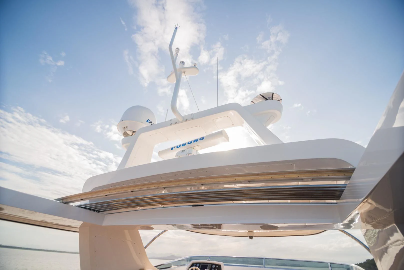 a white boat on a dock aboard BLUE BAY Yacht for Sale