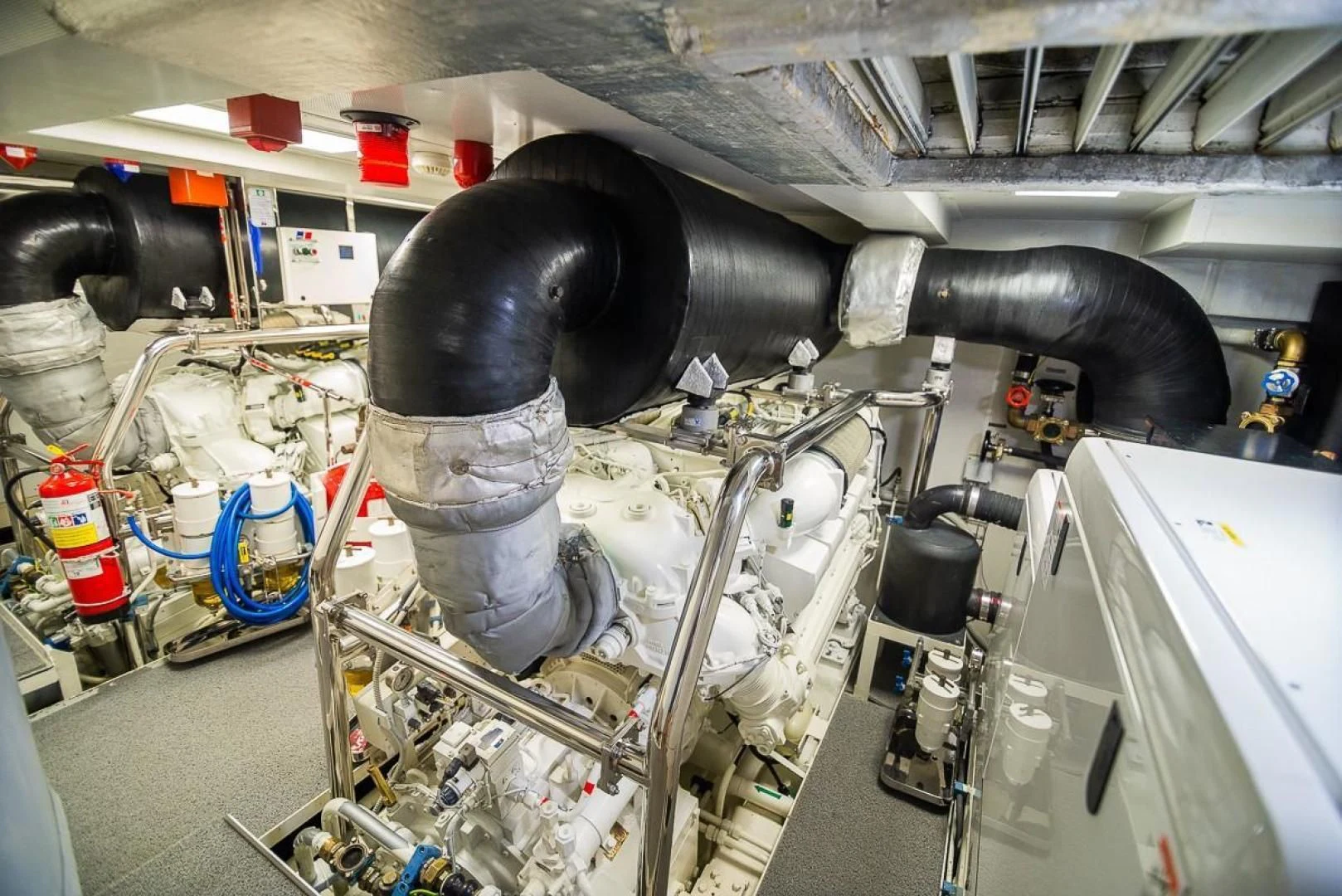 a large machine with a large metal pipe aboard BLUE BAY Yacht for Sale