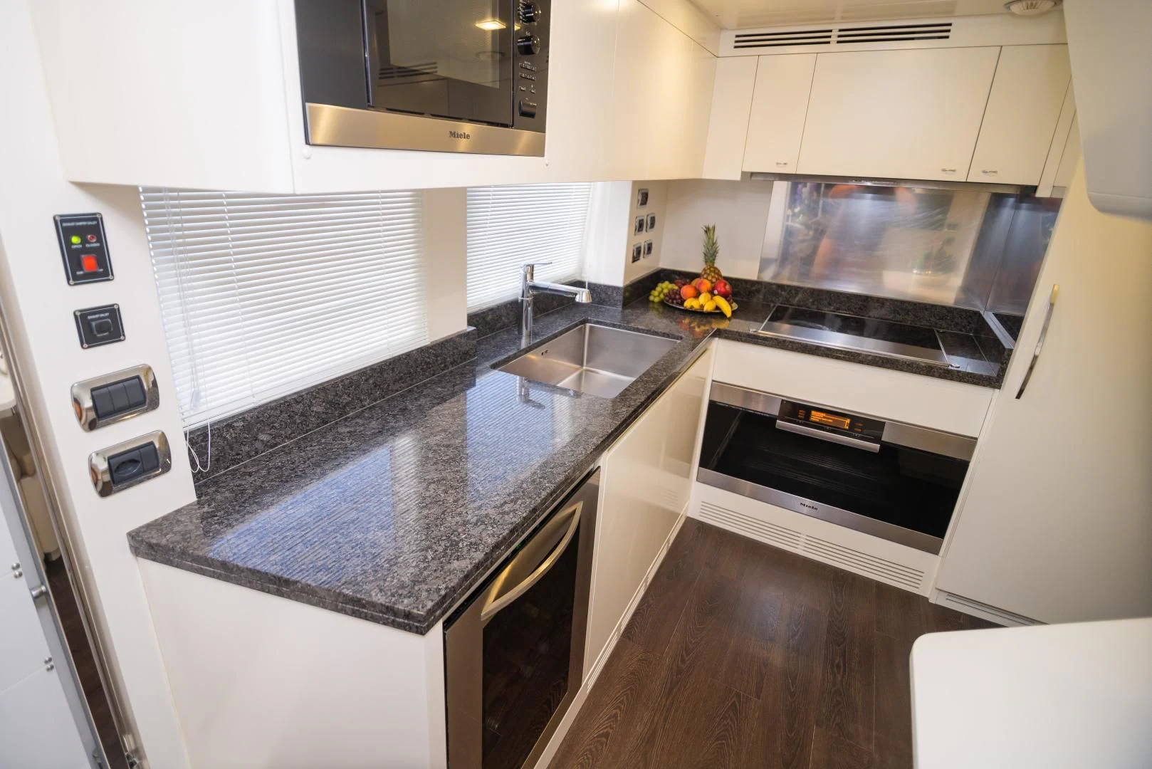 a kitchen with a stove and oven aboard BLUE BAY Yacht for Sale
